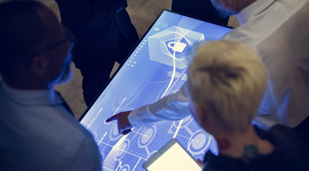 people in a technology cyber space meeting