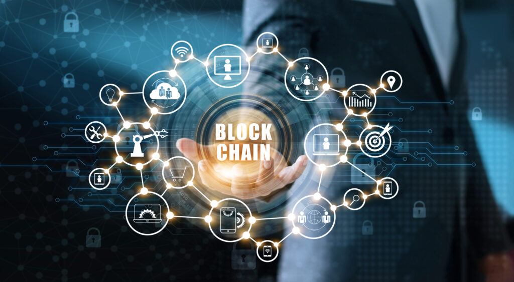 blockchain-technology-and-network-concept-businessman-holding-text-blockchain-in-hand-with-icon-network-connection-on-blue-security-and-digital-connection-background