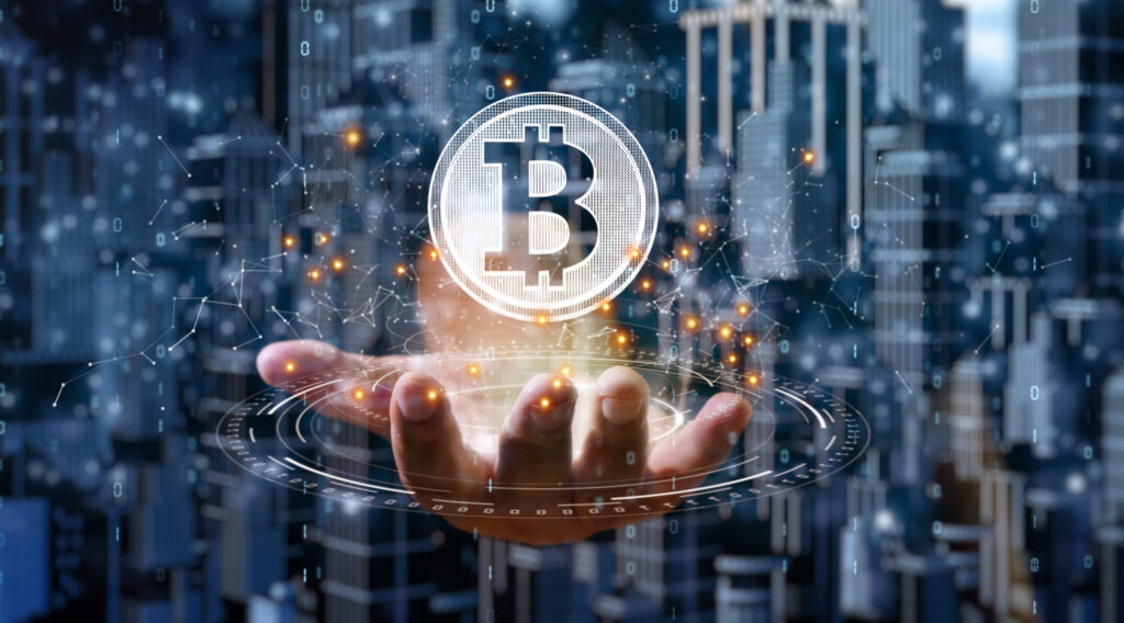 businessman-is-holding-a-bitcoin-as-part-of-a-business-network-cryptocurrency-blockchain-connection-technology-and-financial-investment-background-concept